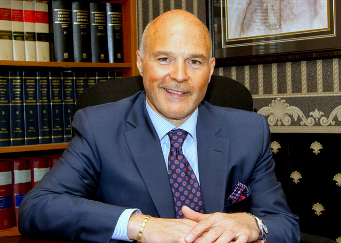 Angelo Fazari in the office library